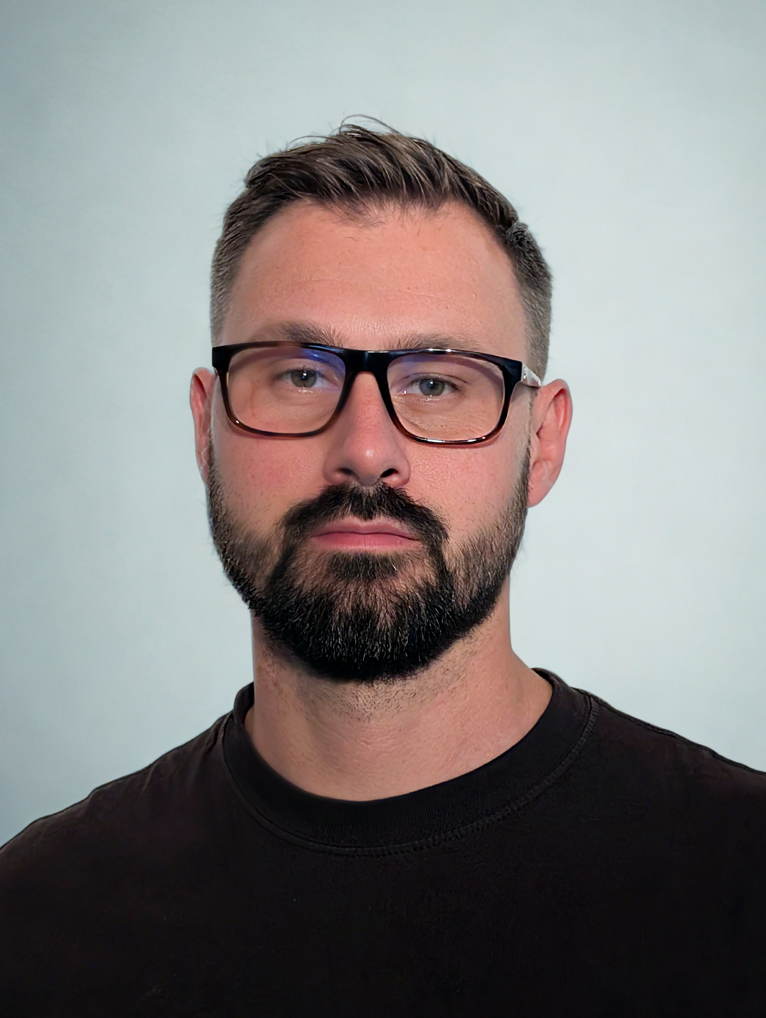 Professional headshot of Miroslaw Steblik